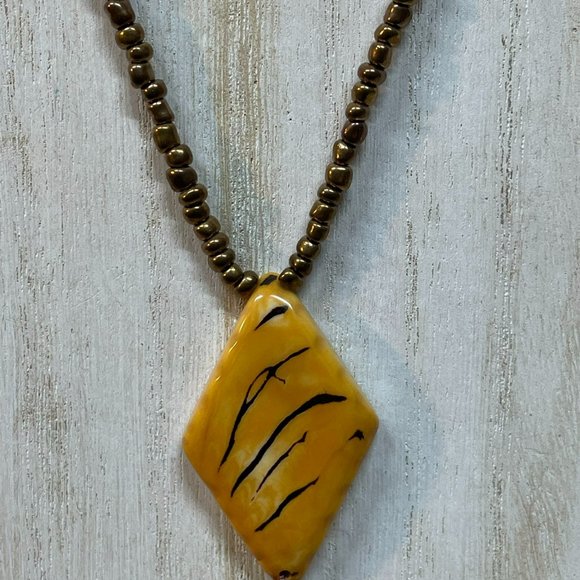 ORGANIC TAGUA NUTS LONG PENDANT ON LEATHER DANGLE NECKLACE GOLD BROWN ARTISAN - Picture 3 of 8